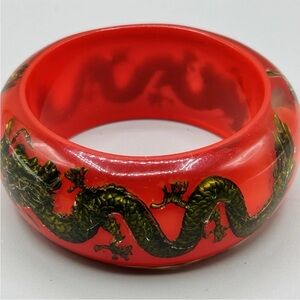RED BANGLE with Shiny Black w/Gold Dragons Embedded in Clear Resin backed in Red